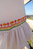 Kiss My Grits Embroidered Flounce Hem Top Ivory